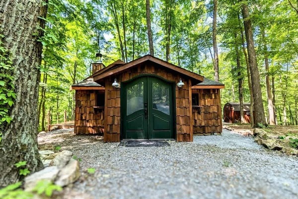 The cabin is a very unique tiny home with the charm of a fairytale.