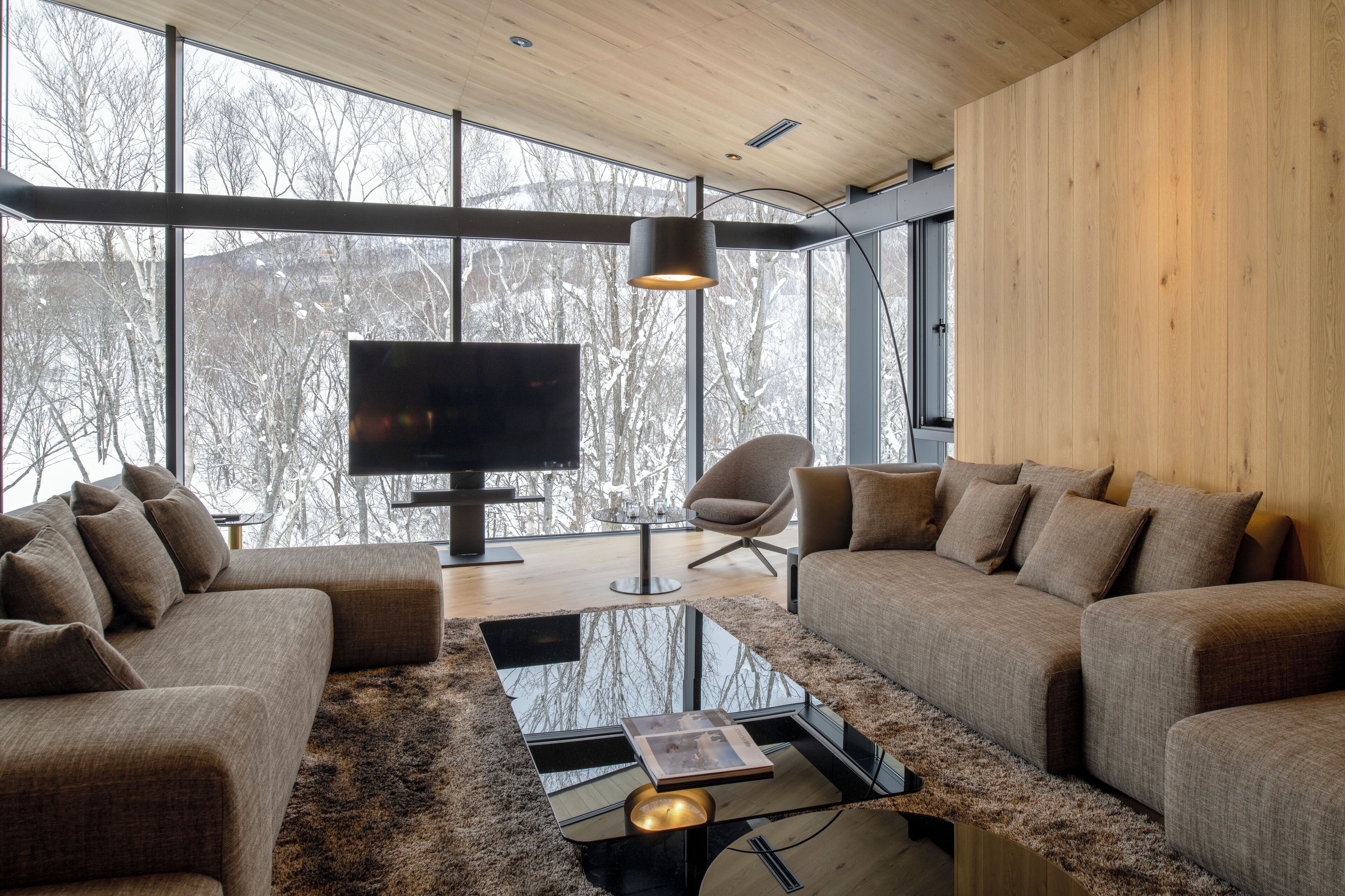 Tsubasa at Hanaridge 4+1 Bedroom Chalet with Onsen | Living area | 30-inch flat-screen TV with digital channels, fireplace, Netflix