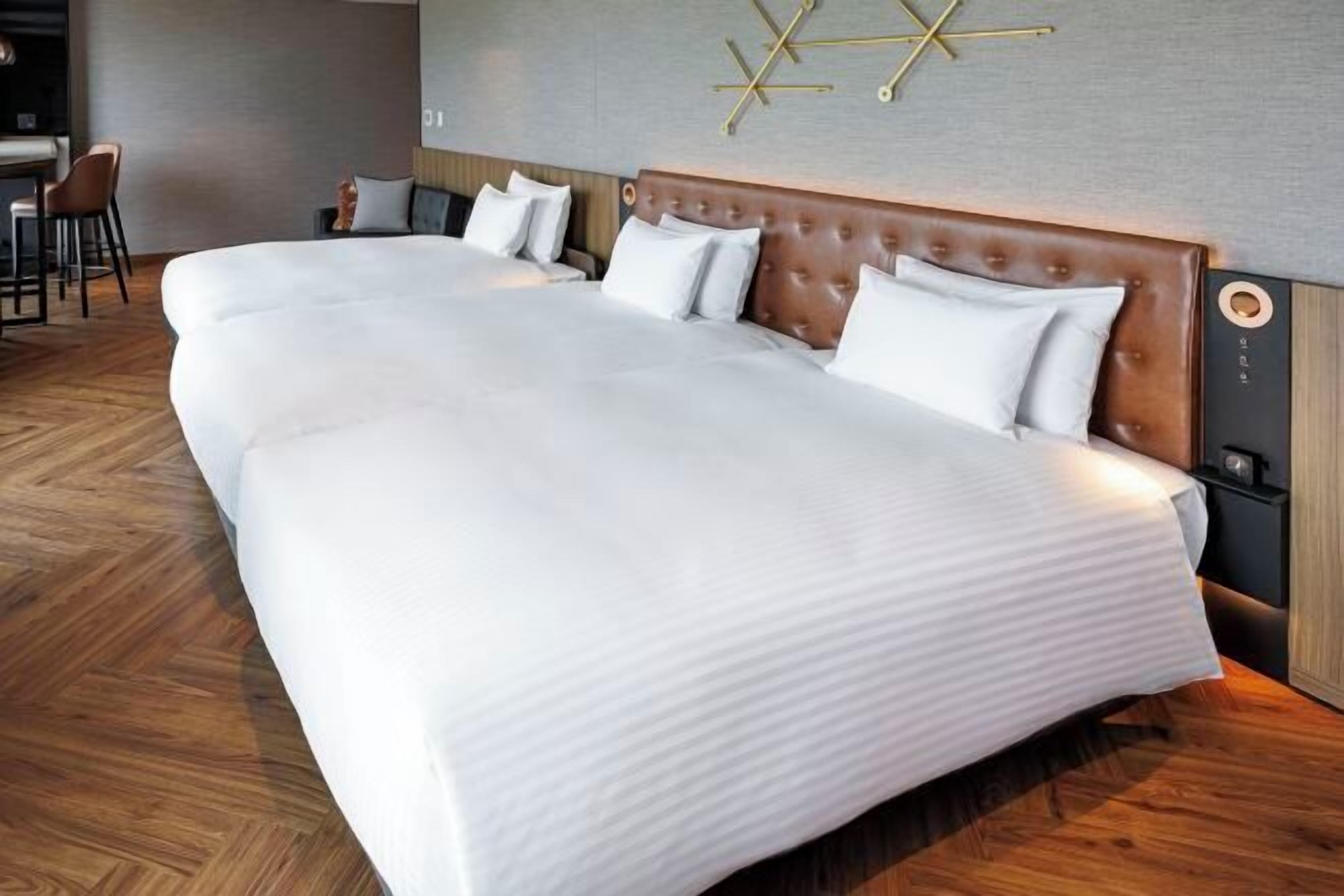 Premium bedding, down duvets, pillow-top beds, in-room safe