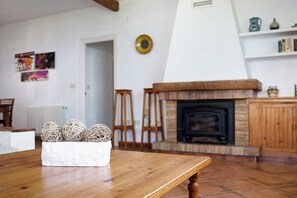 TV, fireplace - Vacation Home "Villa Sevilla" with Sea View, Private Terrace & Private Garden (Conil de la Frontera)