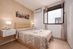 1 dormitorio, tabla de planchar con plancha, wifi gratis y ropa de cama