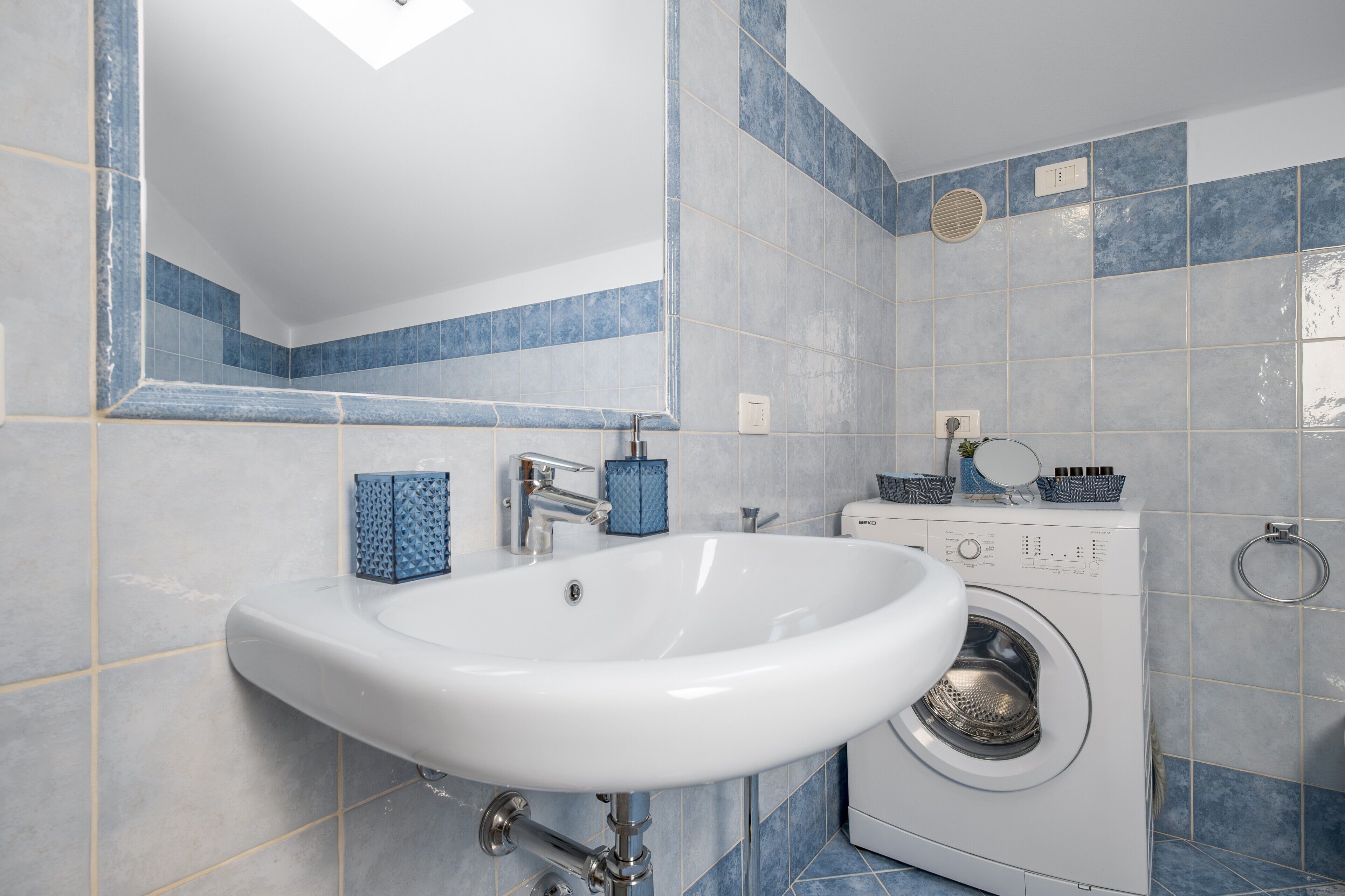 Bathtub, hair dryer, towels