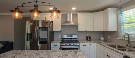 Fridge, oven, dishwasher, coffee/tea maker