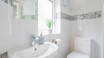 Hair dryer, towels, toilet paper