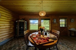 Dining - Hideaway Cabin: Ruggedly Sophisticated Cabin with Mountain Views, Fire Pit, and Pets Invited • Minutes to Buffalo & Trails. (Buffalo)
