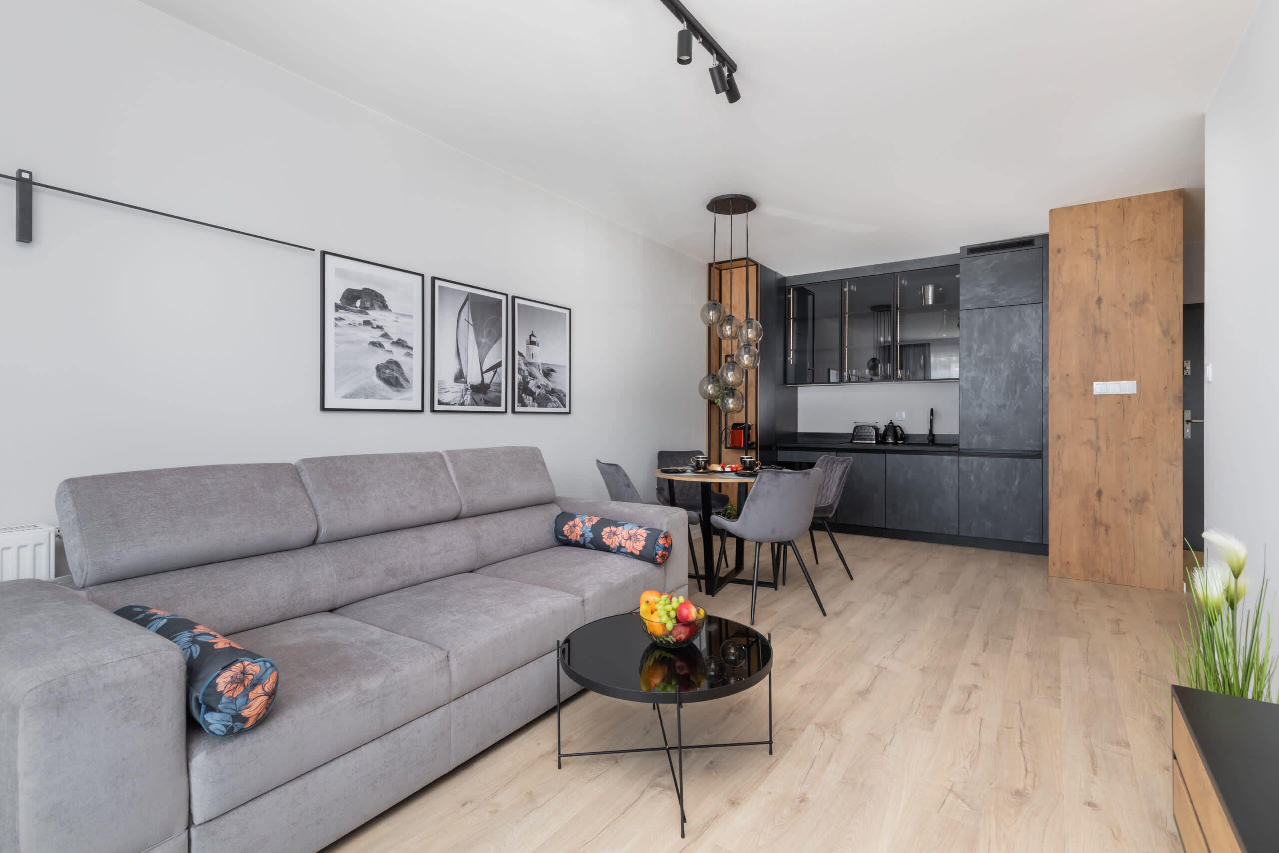 Living room with a comfortable sofa and TV. 