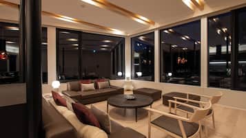 Yuki Sugi at Intuition 5 bedroom Chalet with Onsen | Living area | Smart TV, fireplace, Netflix, streaming services
