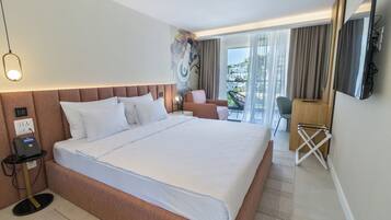 Premium Triple Room, Non Smoking, Sea View | Premium bedding, memory foam beds, in-room safe, desk