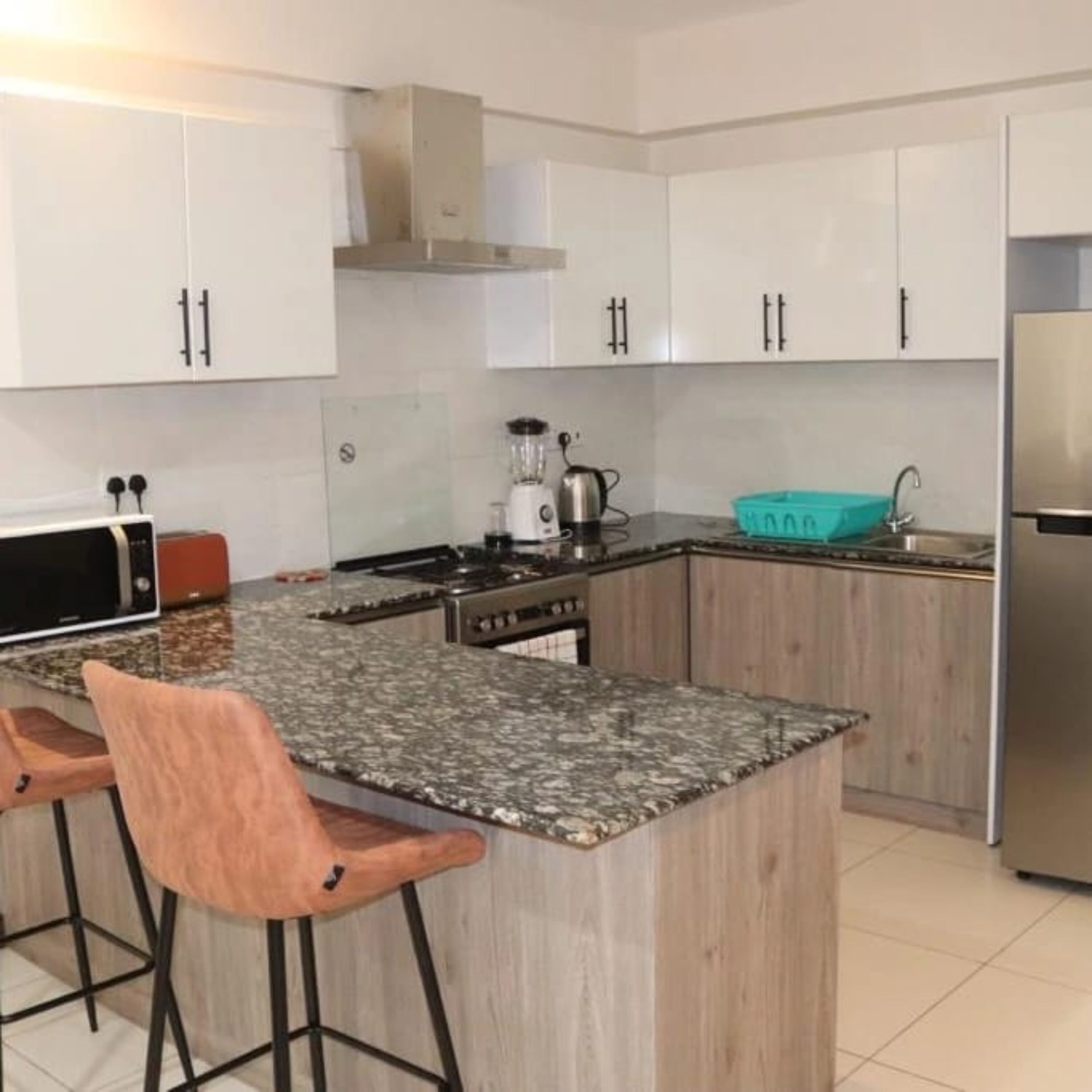 Apartamento executivo | Cozinha privada | Geladeira, micro-ondas, fogão, torradeira