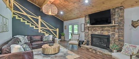 Smart TV, fireplace, books