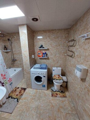 Hair dryer, towels, soap, shampoo