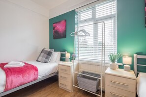 1 dormitorio, tabla de planchar con plancha, wifi gratis y ropa de cama
