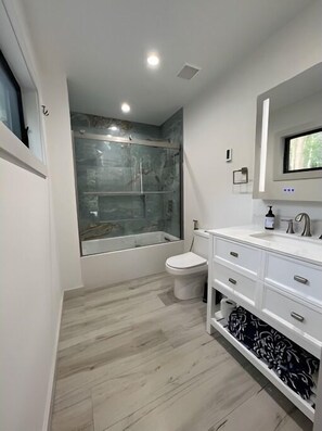 Hair dryer, bidet, towels, soap