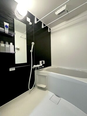 Hair dryer, bidet, towels, soap