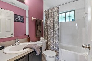 Bathtub, hair dryer, towels, soap