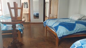 Family Single Room, Multiple Beds | Premium bedding, down comforters, in-room safe, free WiFi - Intipunku hospedaje (Cusco)