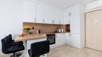 Apartment, 1 Bedroom, Balcony | Private kitchen | Microwave, dishwasher, coffee/tea maker, cookware/dishes/utensils