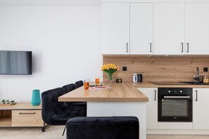 Apartment, 1 Bedroom, Balcony | Private kitchen | Microwave, dishwasher, coffee/tea maker, cookware/dishes/utensils - Studio Łużycka With Parking by Renters (Swinoujscie)