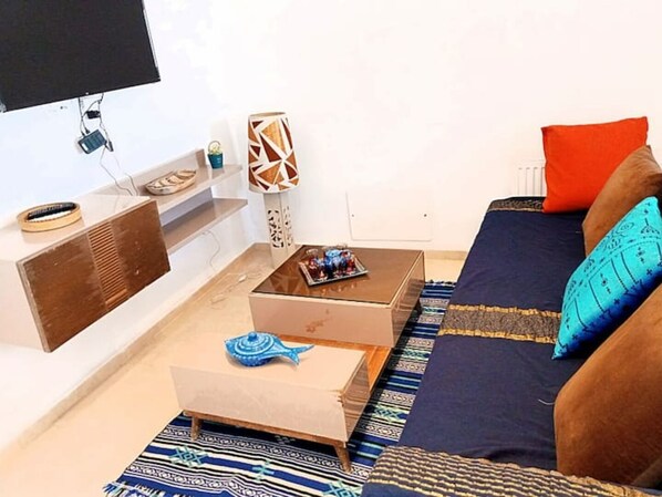 Una Smart TV, un reproductor estéreo