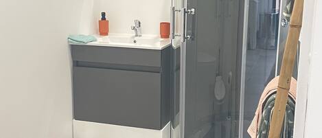 Shower, towels, soap, shampoo