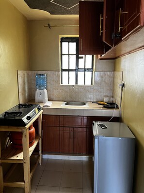 Apartamento | Cozinha privada | Geladeira, fogão, chaleira elétrica