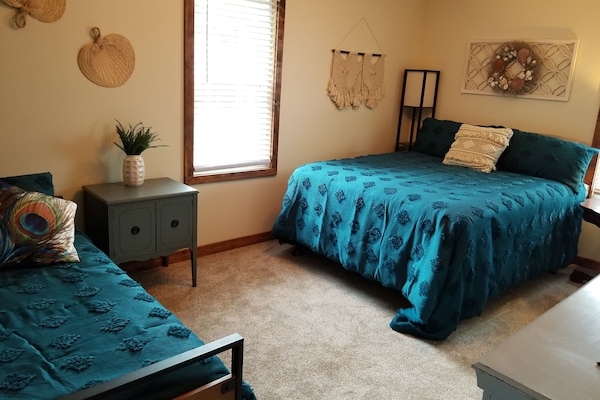 queen, daybed and trundle on main level. This room has a private bathroom.