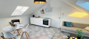 Bright, spacious attic apartment. 