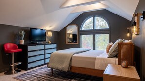 A bedroom with a bed, a TV, a desk, and a chair. - Modern Mount Snow Gnarvana - Balcony, Loft, Pets, Hiking (Dover)