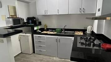 Apartment | Private kitchen | Fridge, microwave, oven, stovetop