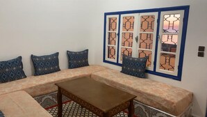 Apartment | Living area - Inviting 1-bed Apartment in Ksar Sghir (Ksar El Majaz)