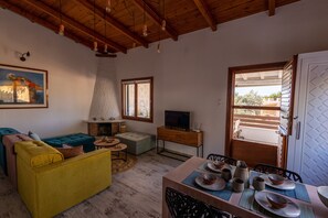 Ferienhaus | Wohnbereich | Kamin