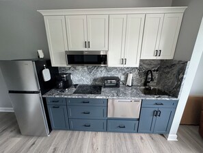 Fridge, microwave, stovetop, dishwasher - #2400 Pointe - Studio Suite at Mariners SML (Huddleston)