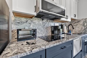 Fridge, microwave, stovetop, dishwasher - #2400 Pointe - Studio Suite at Mariners SML (Huddleston)