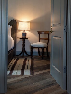 Single King Suite | 1 bedroom, desk, laptop workspace, iron/ironing board