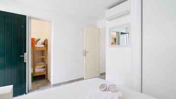 2 dormitorios, tabla de planchar con plancha, wifi gratis y ropa de cama