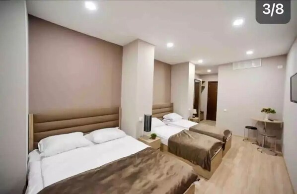 1 غرفة نوم ومكواة/لوح كي وواي فاي وملاءات أسرّة