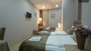 1 غرفة نوم ومكواة/لوح كي وواي فاي وملاءات أسرّة