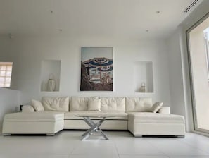 A modern living room with a white sectional sofa, a metallic coffee table, and a large abstract painting on the wall. - Click OMG Views - A Secret Provence Gem 2-8p πποΈπ‘π
π₯οΈππ πποΈπ· β¨πΆπ§ββοΈ (Cassis)