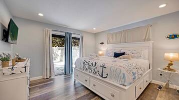 3 dormitorios, tabla de planchar con plancha, cuna de viaje