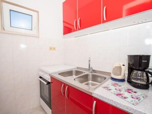 Fridge, microwave, oven, cookware/dishes/utensils