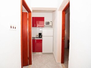 Fridge, microwave, oven, cookware/dishes/utensils