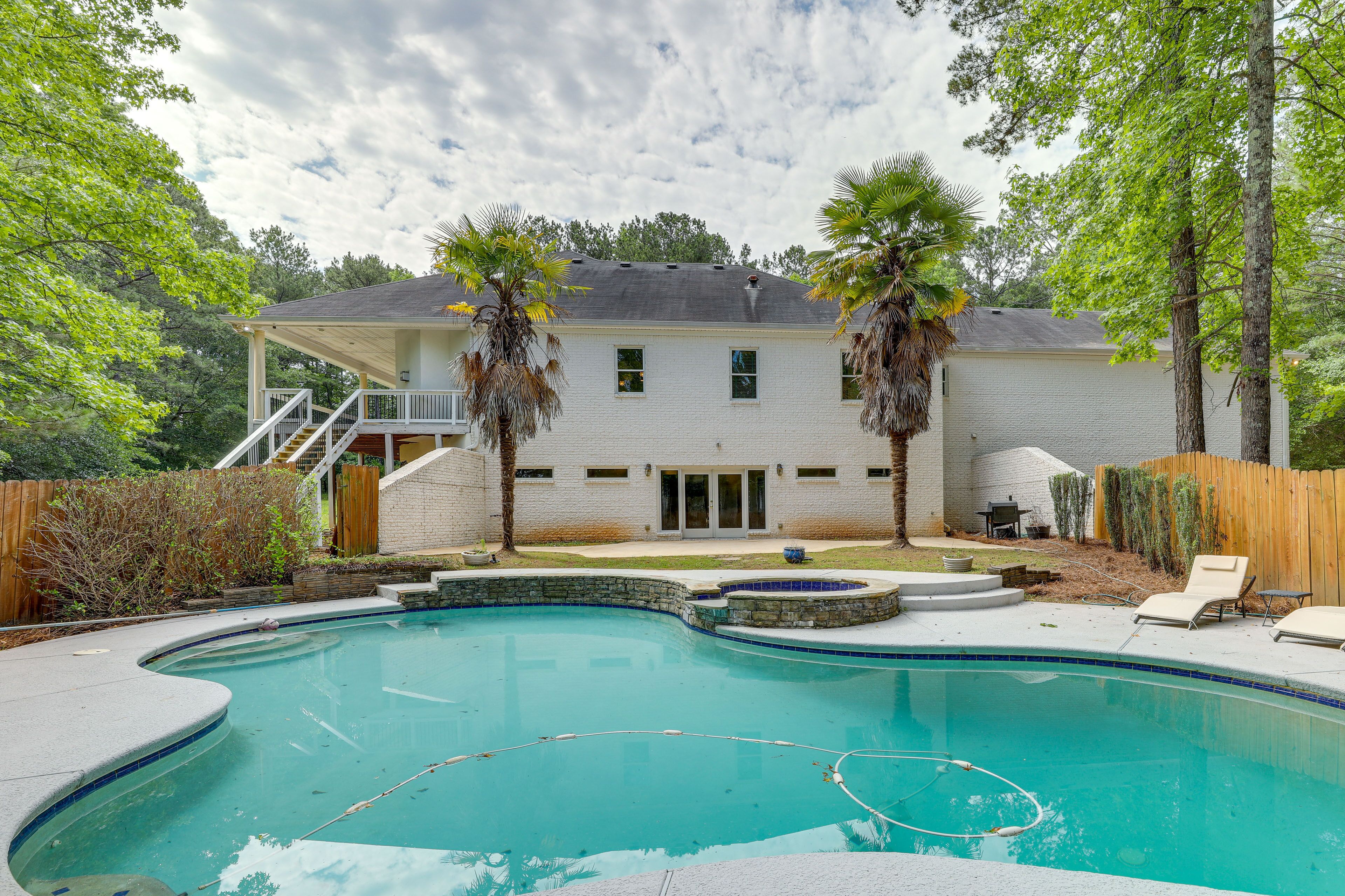 Chic Georgia Abode w/ Home Theater, Pool & Hot Tub