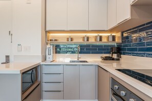 Apartment | Private kitchen - Beach Class Resort Muro Alto 2201 (Ipojuca)
