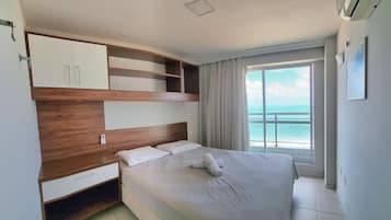 Apartamento família | Cortinas blackout, Wi-Fi de cortesia, roupa de cama
