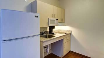 Mini-fridge, microwave, oven, stovetop