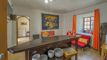 Mini-fridge, microwave, cookware/dishes/utensils