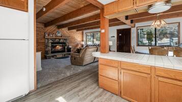 Basic Cabin | Private kitchen | Full-size fridge, microwave, oven, stovetop