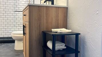 Shower, towels, soap, shampoo