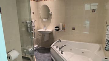 Jetted tub, hair dryer, towels, soap