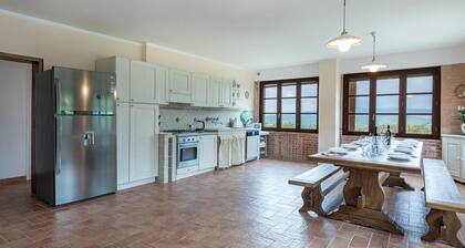 Surrounded by greenery and nature, a newly restored villa and an annex ideal for a group up to 14 pe